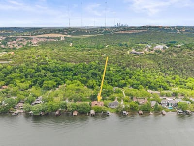 Aerial view with Lake Austin shoreline context at 3104 Rivercrest DR - 4 bed 5 bath home
