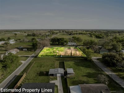 Primary bedroom at 320 Douglas St Unit #2 - S1360 - Old Town Lexington, Lexington, TX