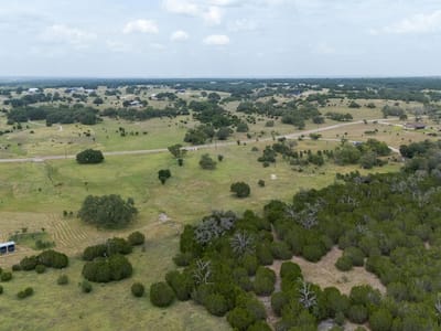 Primary bedroom at 320 S Waterbuck Way - Ranches At Blackbuck Ridge, Lampasas, TX