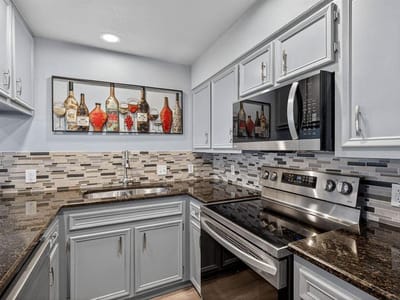 Primary bedroom at 320 Twin Sails Unit #23 - 3 bed 3 bath home