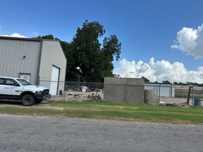 Primary bedroom at 324 W La Fayette St - Moore John H 445, La Grange, TX