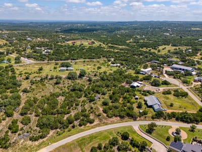 Primary bedroom at 348 Vail River RD - Northridge Ph 3, Dripping Springs, TX