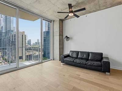 Primary bedroom at 360 Nueces St Unit #1303 - 1 bed 1 bath home