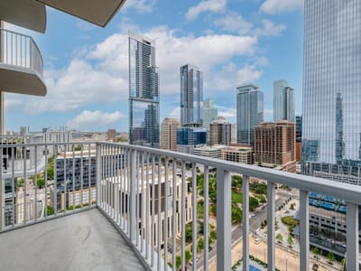 Primary bedroom at 360 Nueces St Unit #2407 - 1 bed 1 bath home