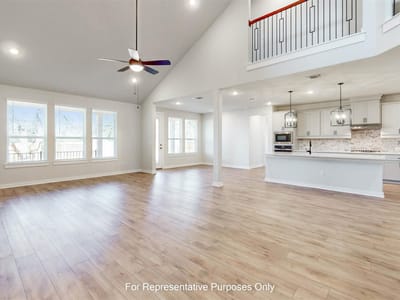 Living area at 3720 Plentywood LN - 5 bed 5 bath home