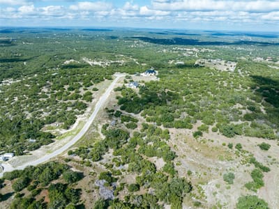 Primary bedroom at 394 Vail River Rd - Northridge Ph 3, Dripping Springs, TX