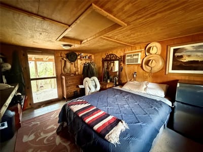 Primary bedroom at 3950 Private Road 2015 - COTTINGHAM, Caldwell, TX