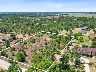 Primary bedroom at 400 McAllister RD - Pine Forest Unit 7 Ph Iii, Bastrop, TX