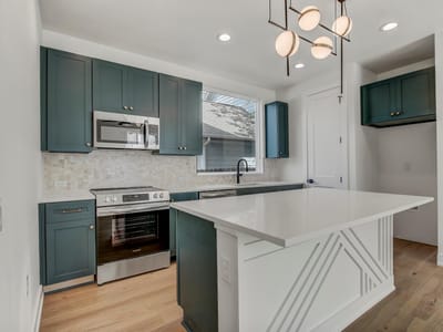 Kitchen at 4127 E 12th St Unit #1 - 3 bed 2 bath home