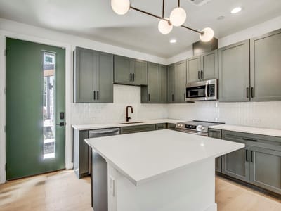 Living area at 4127 E 12th St Unit #3 - 3 bed 2 bath home