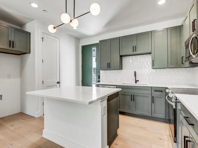 Kitchen at 4127 E 12th St Unit #3 - 3 bed 2 bath home