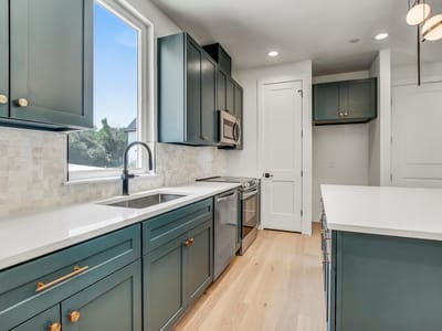 Kitchen at 4127 E 12th St Unit #5 - 3 bed 2 bath home