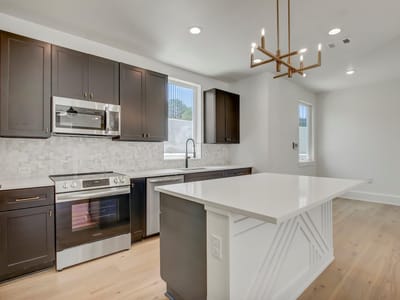 Living area at 4127 E 12th St Unit #8 - 3 bed 2 bath home