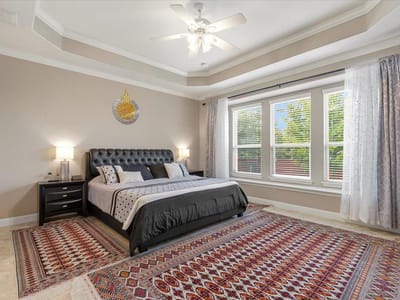 Primary bedroom at 4365 Caldwell Palm CIR - 6 bed 5 bath home
