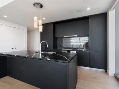 Primary bedroom at 44 East Ave Unit #2307 - 2 bed 2 bath home