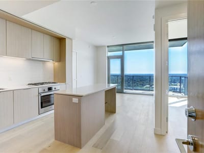 Primary bedroom at 44 East Ave Unit #2408 - 2 bed 2 bath home