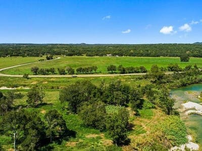 Primary bedroom at 440 Chimney Valley Rd - River Rdg Ranch Sub, Blanco, TX