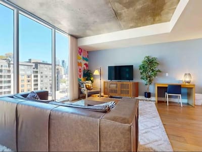 Living area at 48 East Ave Unit #1210 - 2 bed 2 bath home