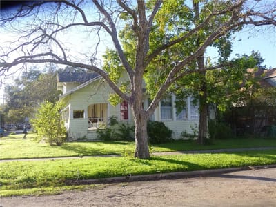 Primary bedroom at 502 W 10th St - 4 bed 2 bath home