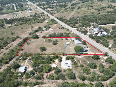 Primary bedroom at 509 State Highway 21 - Cedar Creek Ninety, Cedar Creek, TX