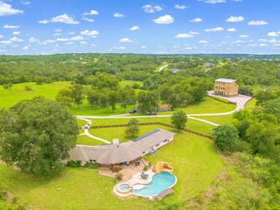 Front exterior with single-story ranch residence at 520 Double Eagle Ranch DR - 6 bed 4 bath home