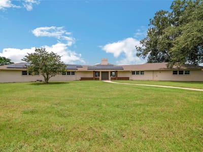 Patio with covered patio and outdoor dining set at 520 Double Eagle Ranch DR - 6 bed 4 bath home