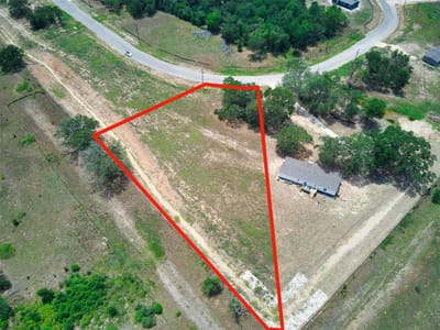 Primary bedroom at 534 Ferguson Loop - Cool Water Acres, Dale, TX