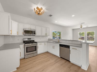 Primary bedroom at 5408 Downs Dr - 5 bed 4 bath home