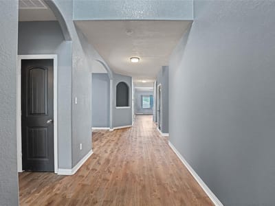 Living area at 5619  Briar Knl - 5 bed 4 bath home
