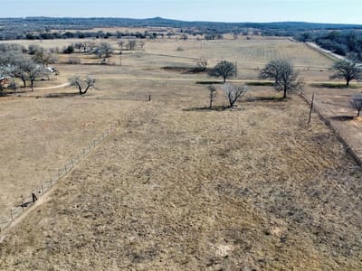 Primary bedroom at 5633 Tenney Creek Rd - Deer Creek, Luling, TX