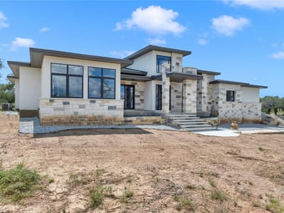 Living area at 6507 Ranch Rd 962 W - 4 bed 4 bath home
