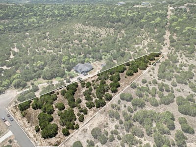 Primary bedroom at 654 Wagon Wheel Trl - Whitewater Springs, Bertram, TX