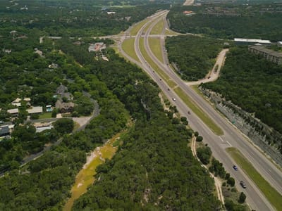Primary bedroom at 6601 N Capital of Texas Hwy - Champion 360 Subd, Austin, TX
