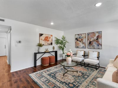 Living area at 6910 Hart LN Unit #203 - 3 bed 2 bath home