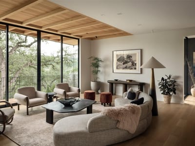 Living area - 7001 Oak Shores Dr Living area with architectural rendering at 7001 Oak Shores Dr - 5 bed 4 bath home