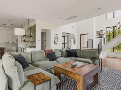 Living area at 705 W 10th ST - 3 bed 3 bath home