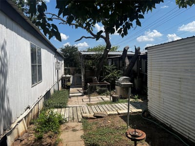 Property photo 3 at 7107 Cowpoke TRL - 4 bed 3 bath home