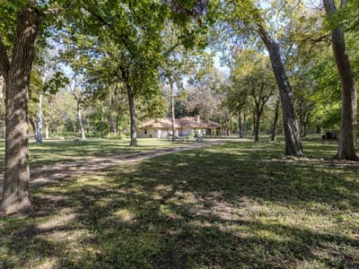 Primary bedroom at 75 County Road 129 - WM Mullen, Taylor, TX