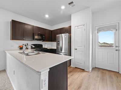 Primary bedroom at 7717 Poppy Petal LOOP - 4 bed 2 bath home