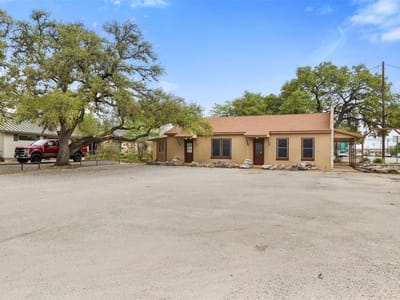 Primary bedroom at 807 Main St - Harrison Heirs, Blanco, TX