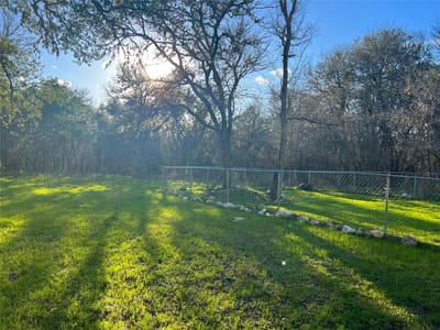 Primary bedroom at 809-811 Perkins ST - Ledouxs Second, San Marcos, TX