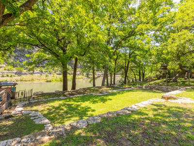 Living area at 8560 River Rd - SCENIC VALLEY, New Braunfels, TX