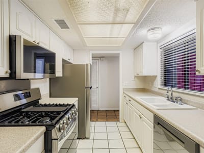 Primary bedroom at 8600 Tallwood Dr Unit #A & B - Austin Woods Amd, Austin, TX