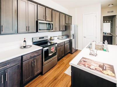Kitchen at 8601 W Gate BLVD Unit #4203 - 1 bed 1 bath home