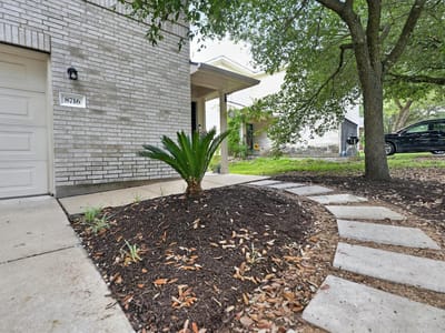 Primary bedroom at 8716 Davis Oaks TRL - 3 bed 2 bath home
