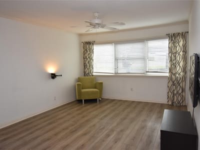 Living area at 8888 Tallwood Dr Unit #2109 - 2 bed 2 bath home