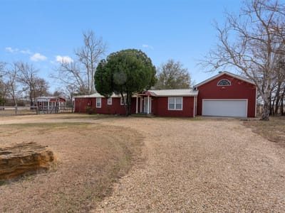 Primary bedroom at 8889 N Fm 487 - 3 bed 2 bath home