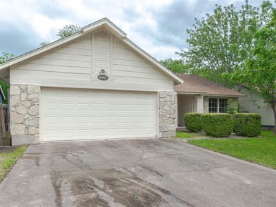 Primary bedroom at 8907 Bill Hickcock Pass - 3 bed 2 bath home