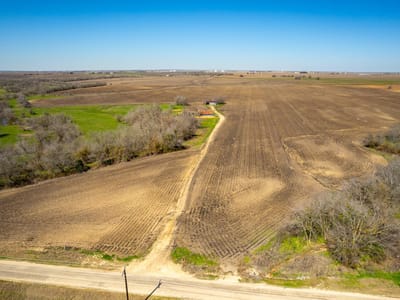 Aerial view with expansive acreage and agricultural land at 901 County Road 398 - Taylor Transitional 2, Taylor, TX