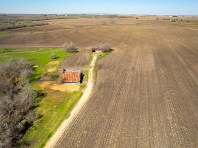 Aerial view with expansive acreage at 901 County Road 398 - Taylor Transitional 2, Taylor, TX